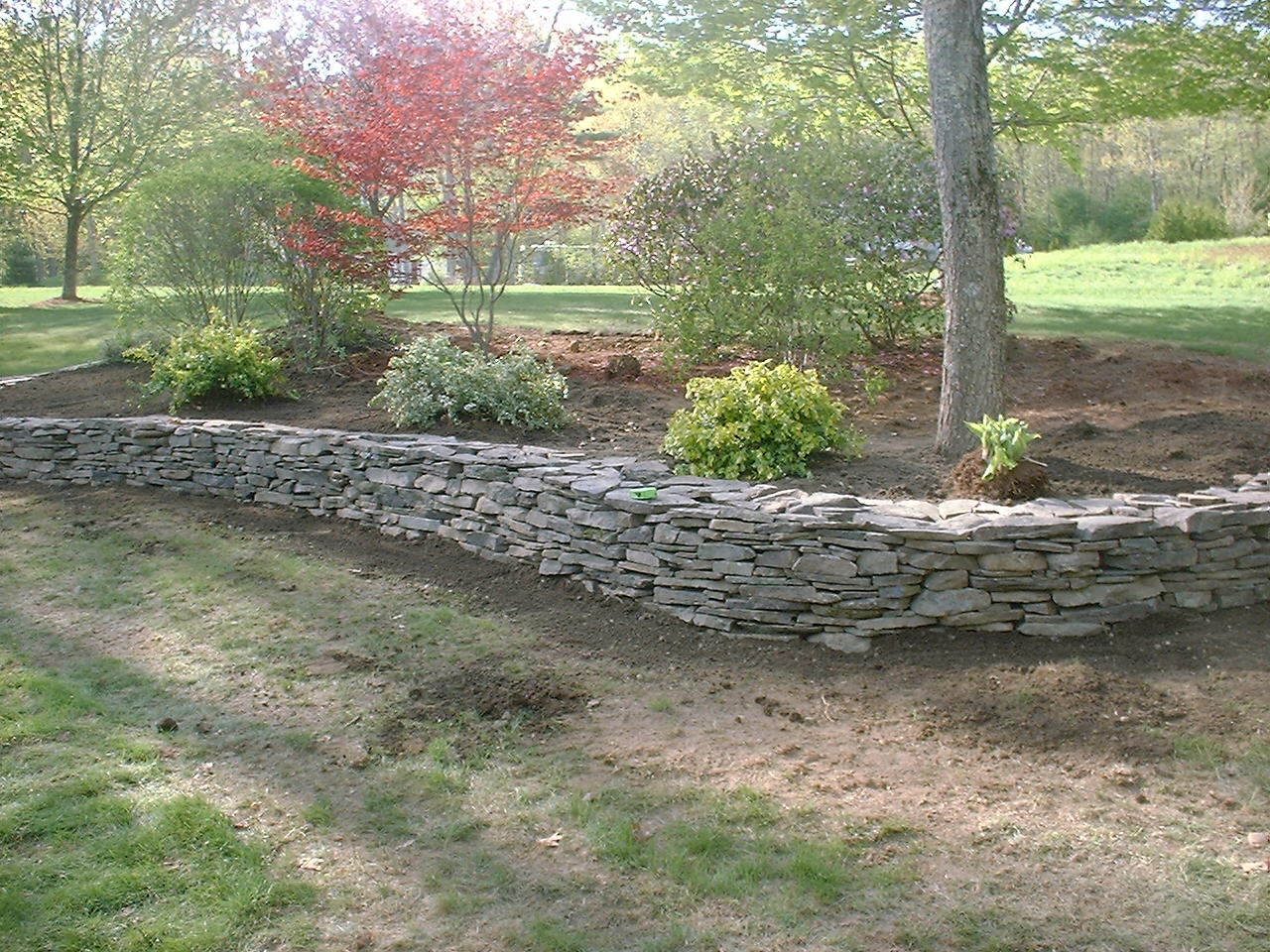 Natural Rock Retaining Wall and Flower Beds – Salem, NH | LaBrie ...