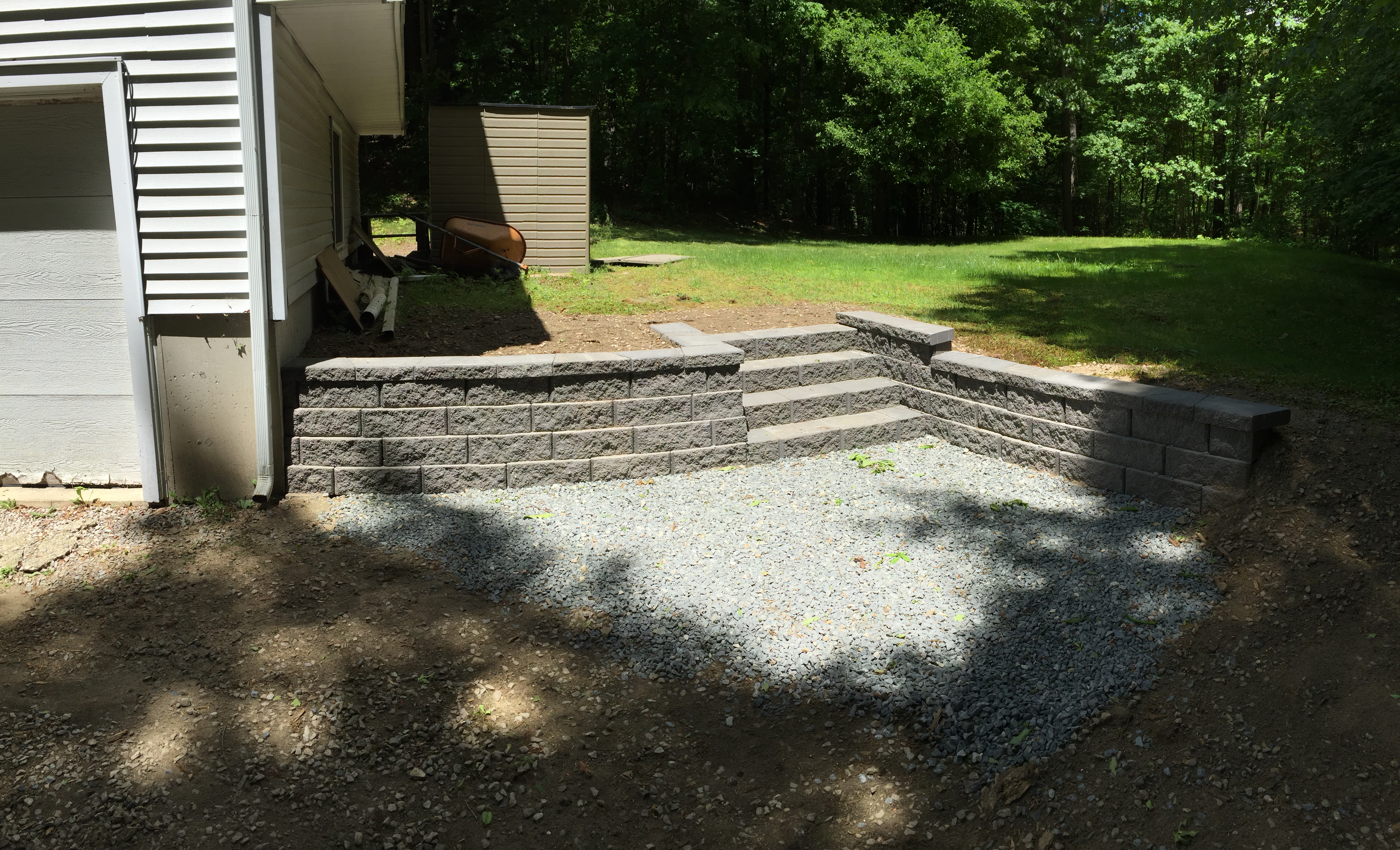 Removal of old retaining wall and installation of new Belgard Brick Retaining wall. Salem, NH